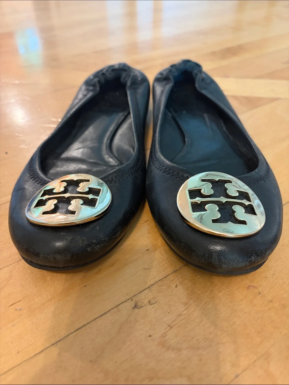 Tory Burch Black Leather Logo Ballet Flats with Gold Medallions